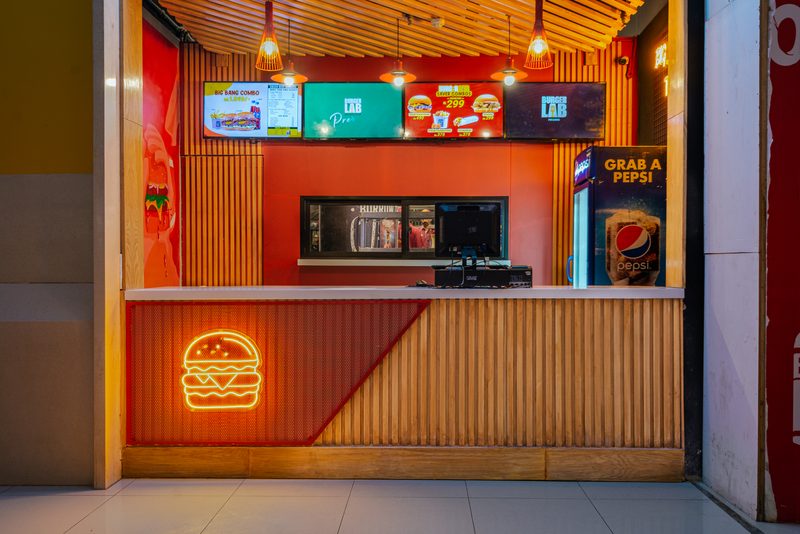 Burger Lab at Lucky One Mall: restaurant counter built by Petra Constructors.
